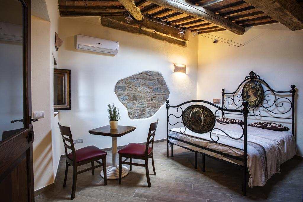 Bed and Breakfast Antico Borgo Seggiano Habitación foto